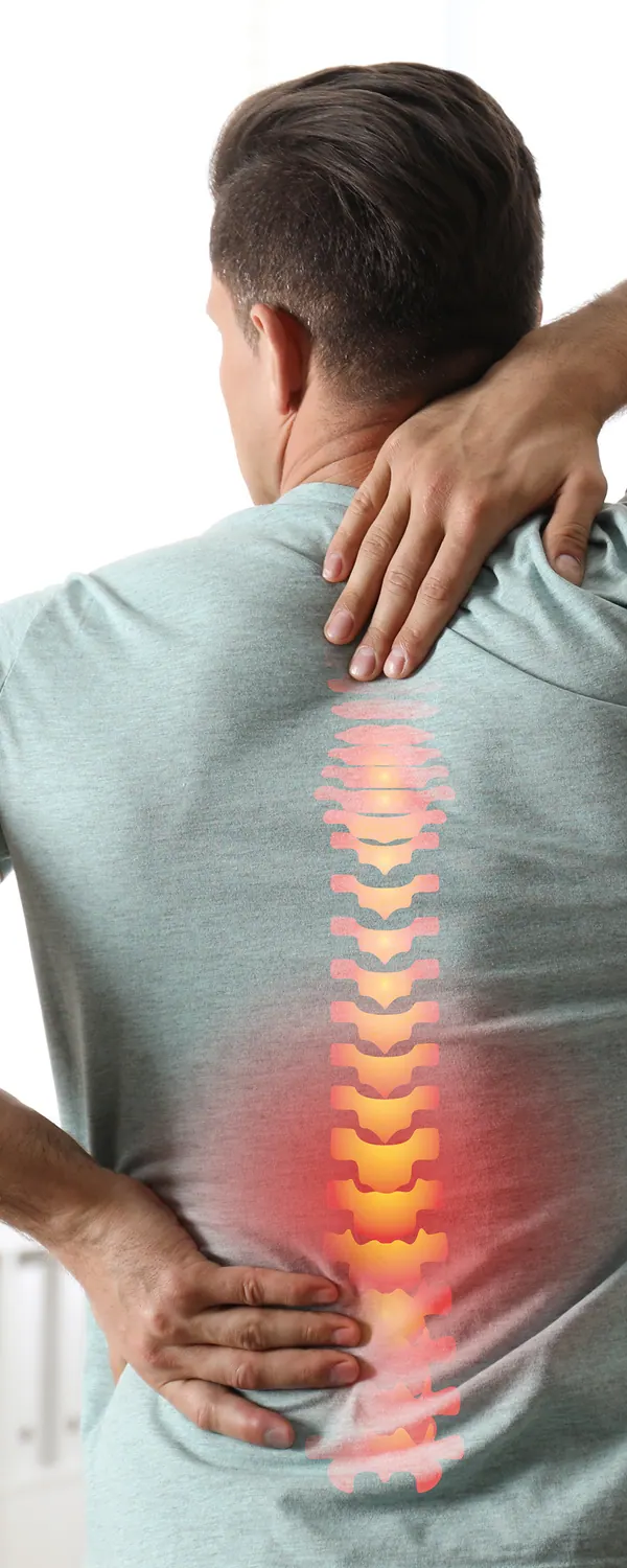 Man with lower back pain, spine highlighted