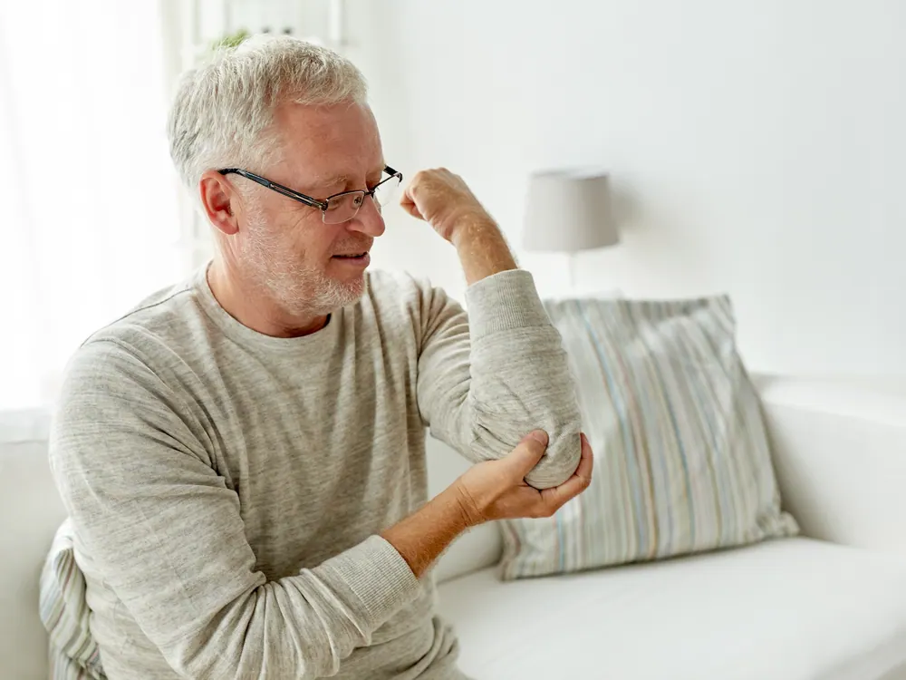 Chiropractic care for elbow pain at HealthSource of Harvest in Harvest