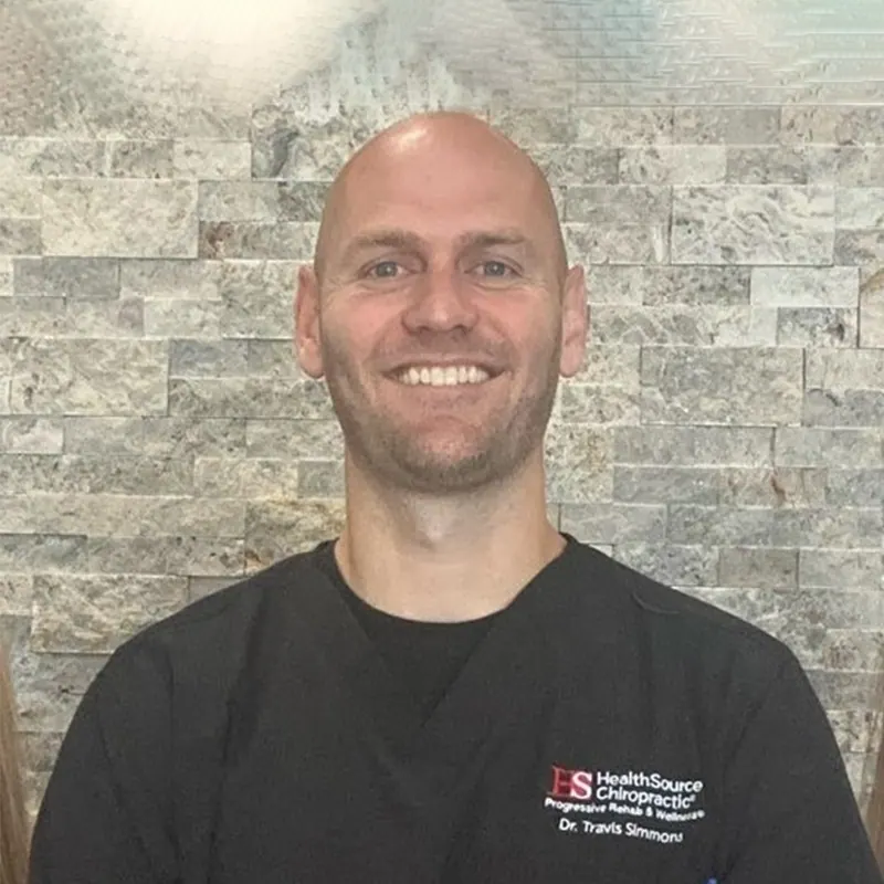 Dr. Travis Simmons, DC